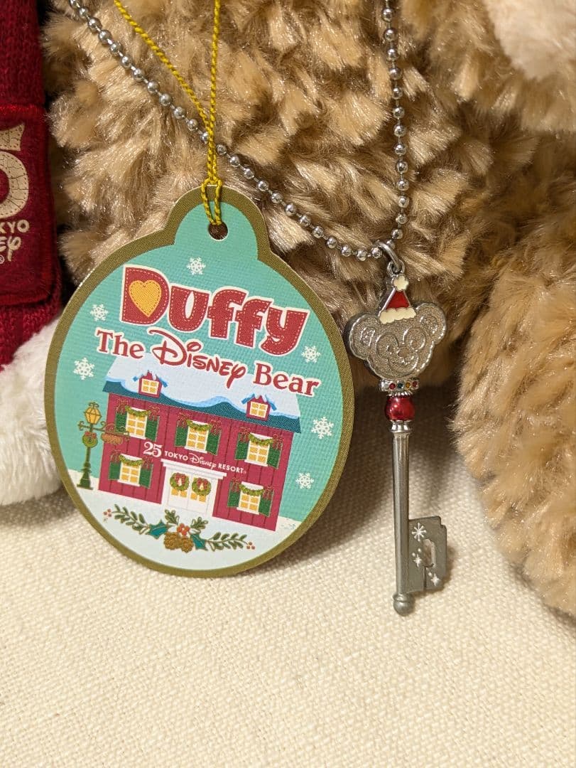 ダッフィー クリスマス オルゴールぬいぐるみ&25周年のチャーム セット