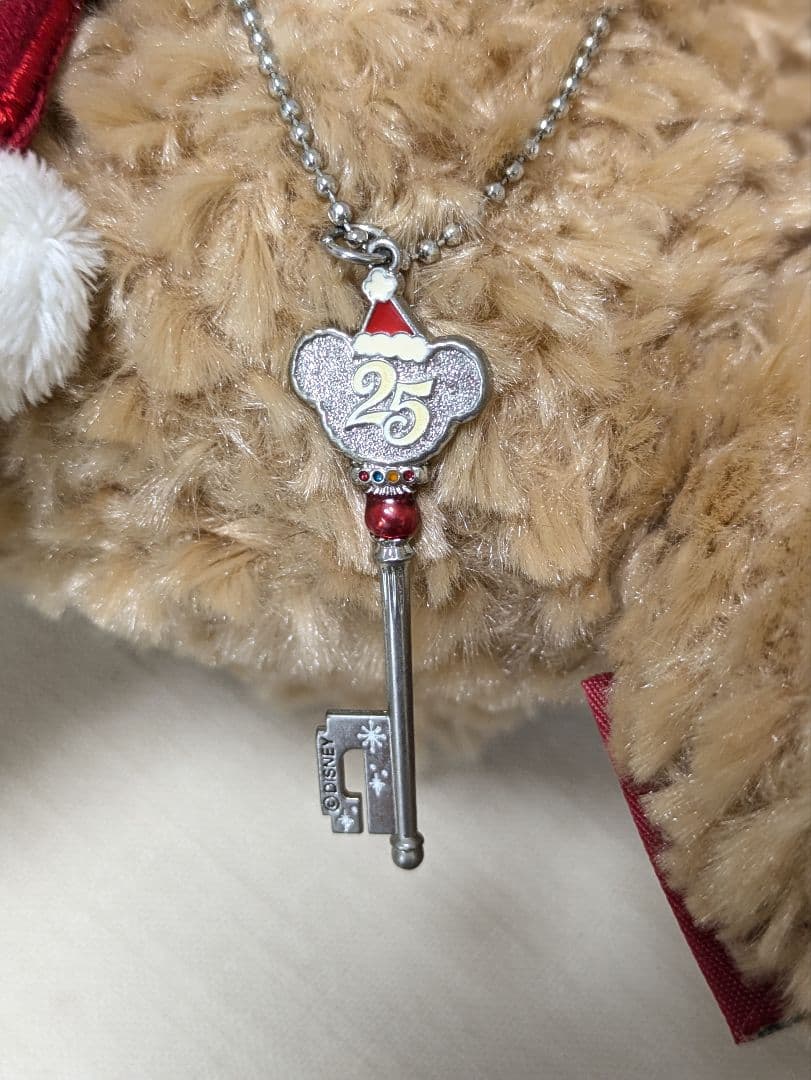 ダッフィー クリスマス オルゴールぬいぐるみ&25周年のチャーム セット