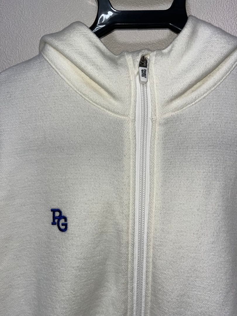 パーリーゲイツ　ホワイト　白　パーカー　ニット　ロゴ　絞り　ジップ