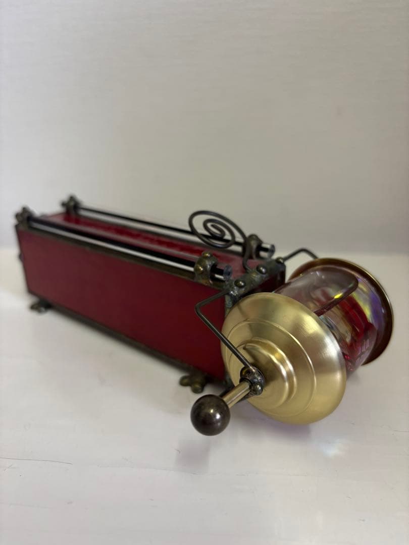 万華鏡　手動クランク式赤と金の装飾品