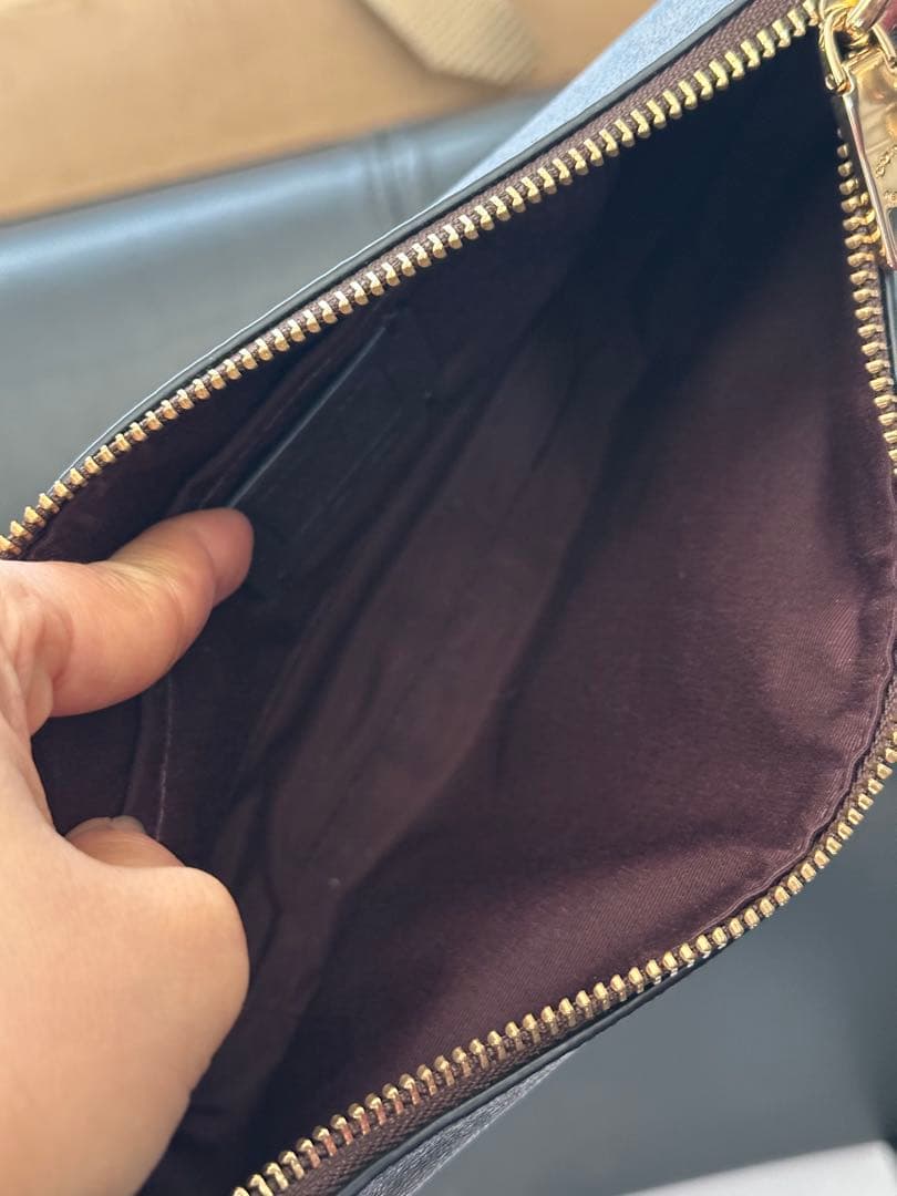 COACH ロゴ入りブラウンバッグ