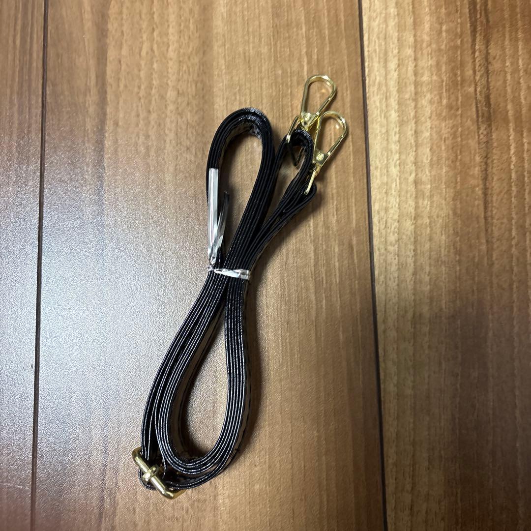 オールオーバーエンボスロゴ ミニハンドバッグ（グレイン）（EC限定カラー）