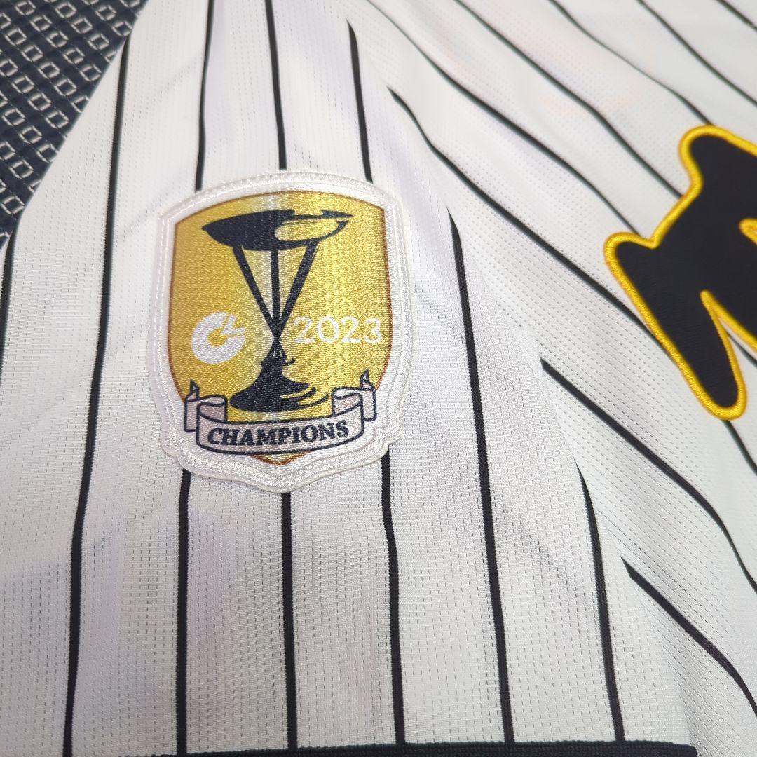 阪神タイガース　チャンピオン　エンブレム付き　ユニフォーム　佐藤輝明【Ｌサイズ】