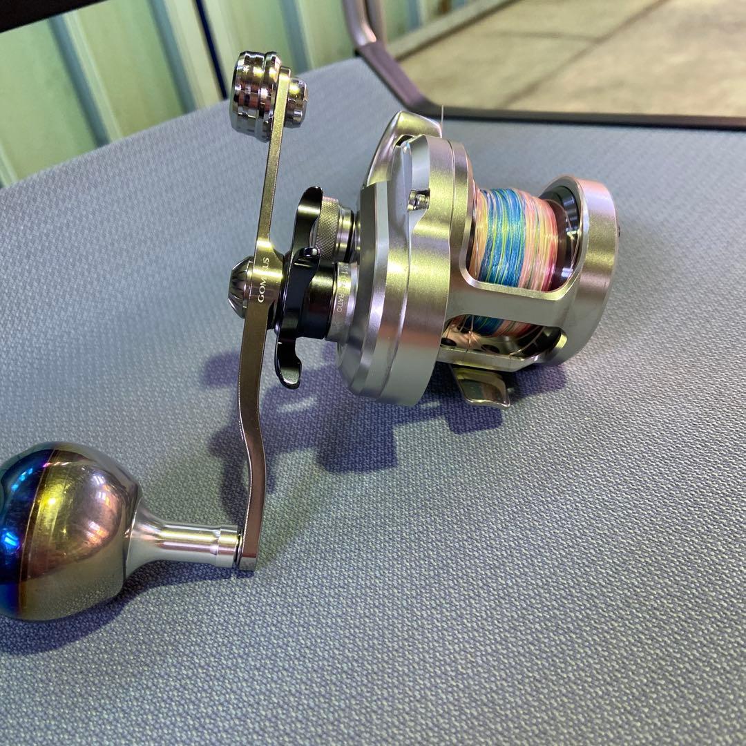 オシア ジガー ベイトリール マルチカラーライン付きゴメクサスハンドル付き