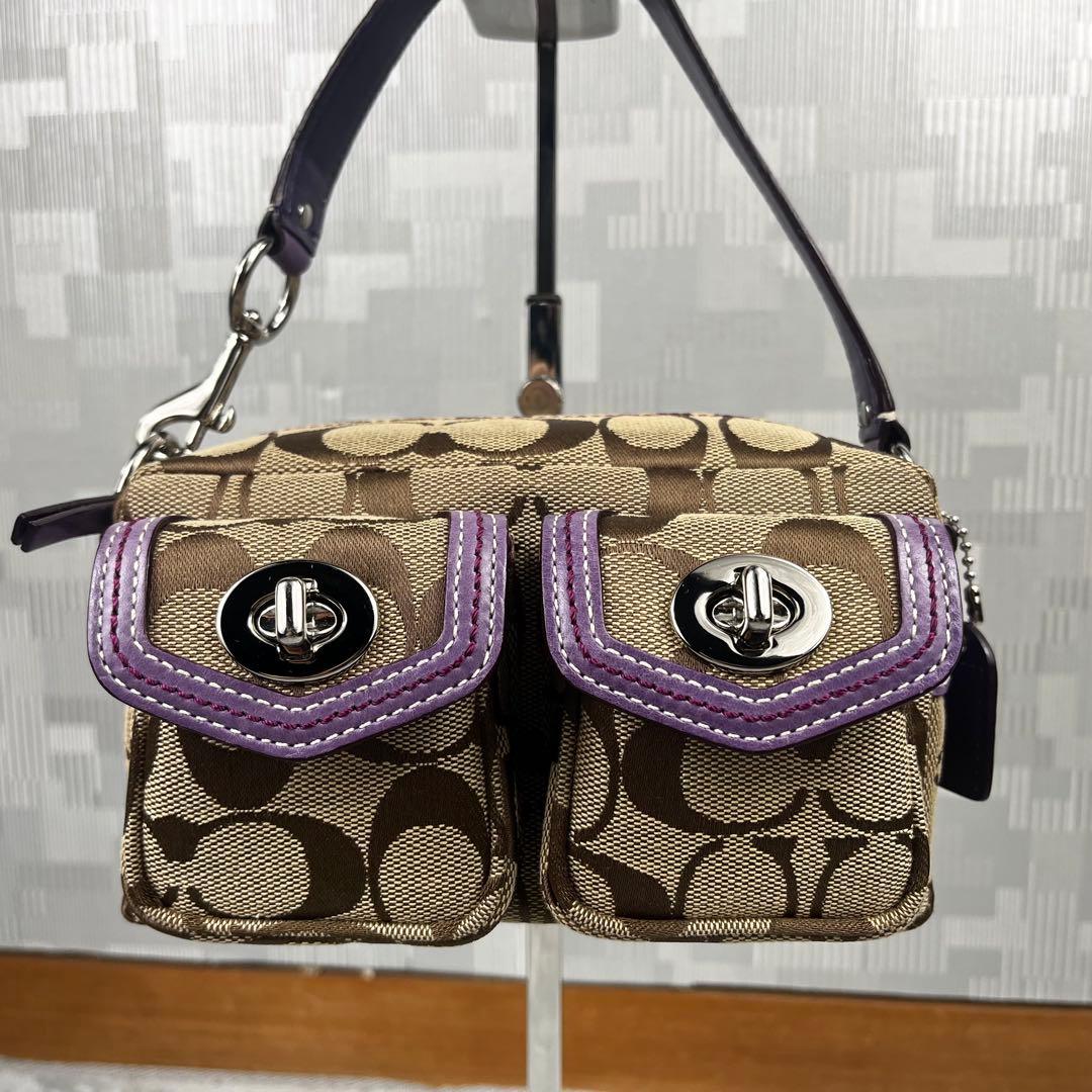 極美品 COACH コーチ アクセサリーポーチ ターンロック レガシー パープル