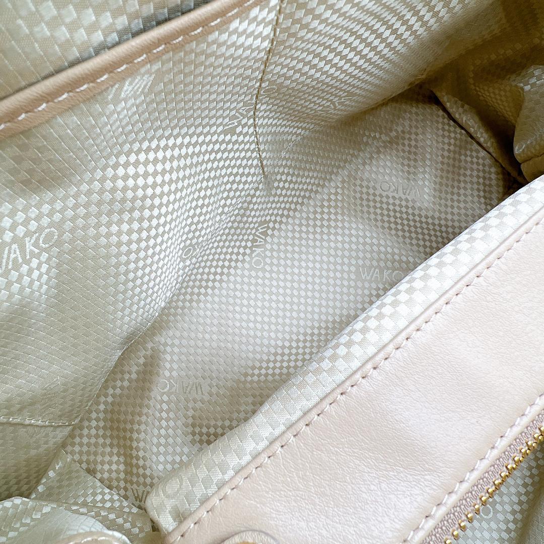 極美品WAKO ゴールドハンドル ハンドバッグ タッセル レザー f557