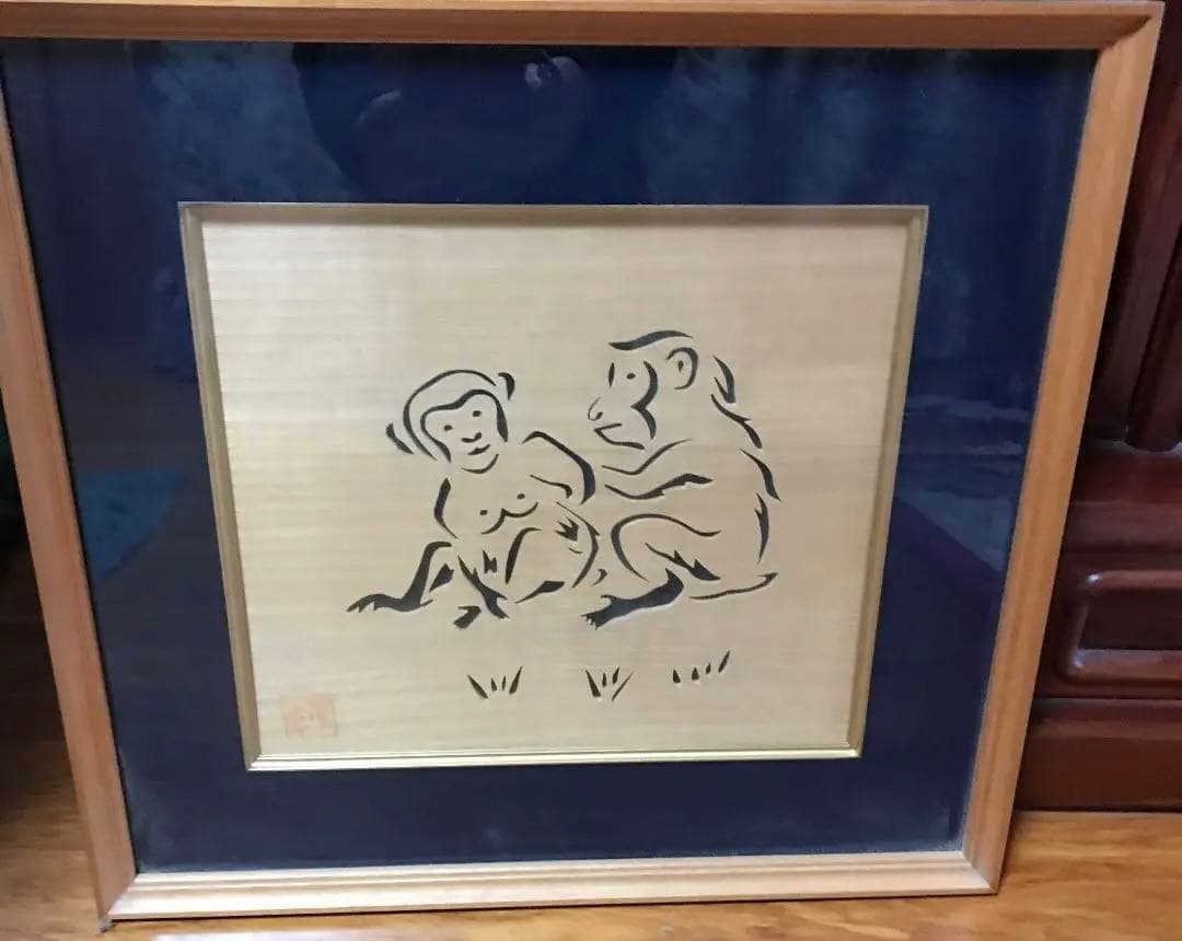 夫婦猿の木彫り