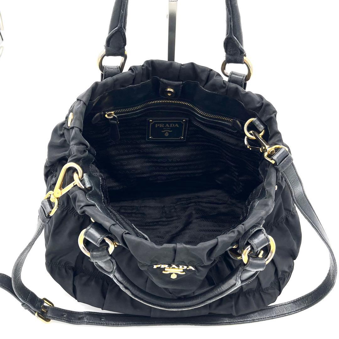 PRADAプラダ ボンバー ギャザー メタルロゴ G金具 2WAYハンドバッグ黒