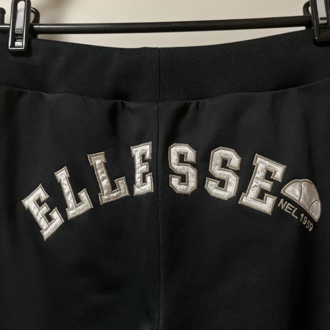 ELLESSE ジャージセットアップ ブラック パンツバックロゴ刺繍レディースＭ