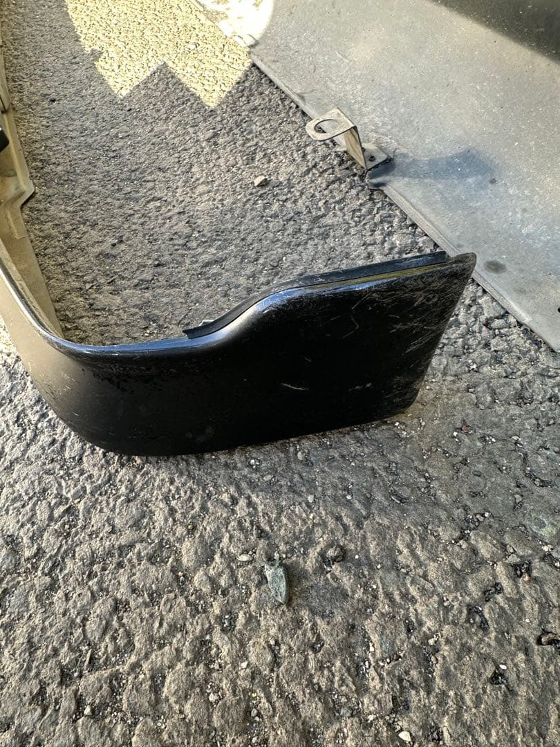 ラパンSSHE21S フロントリップスポイラーとサイドステップ左右ヒビ複数あり黒