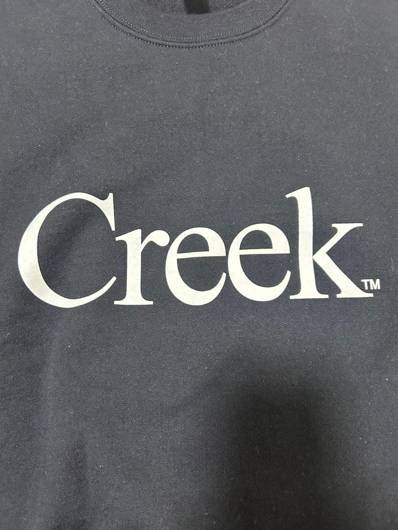 し*ん様 Creek ロゴ BLACK CREW NECK クルーネック トレー