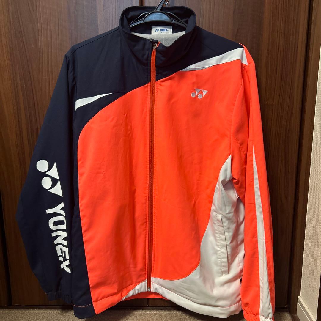 YONEX ジップアップジャケット オレンジ/紺