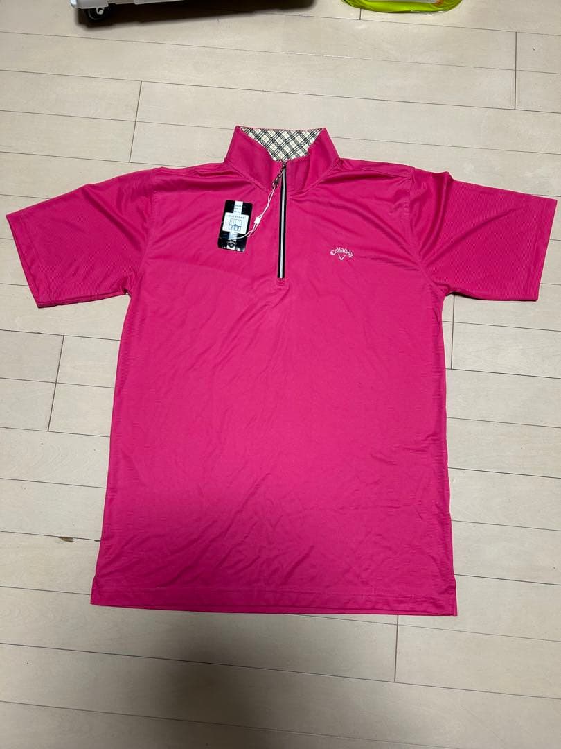 ①ドライスポーツTシャツ（ピンク色） ②ウインドウ・レインブレーカー（薄水色）