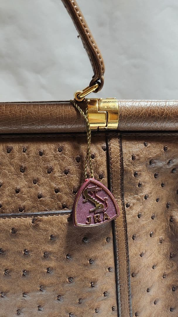ブラウンオーストリッチハンドバッグ JRAロゴ付き