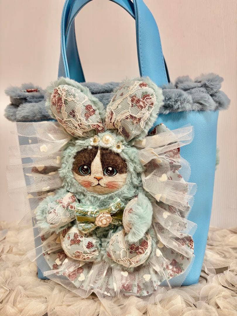 コヤンイサムチョン　フェイクレザーブルーのトートバッグ