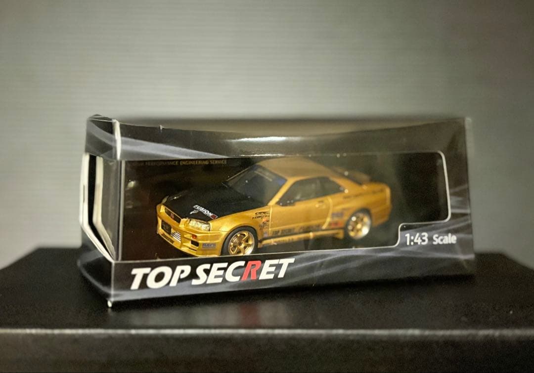 東京オートサロン 限定TOP SECRET R34 Gold1/43スケール