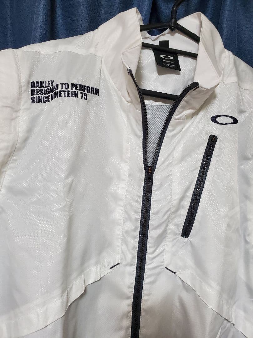 Oakley ホワイトゴルフジャケット メンズウェア