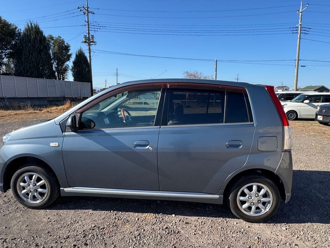 ダイハツ　ミラアブイー❗️柿本マフラー　社外ナビ　ワンセグTV