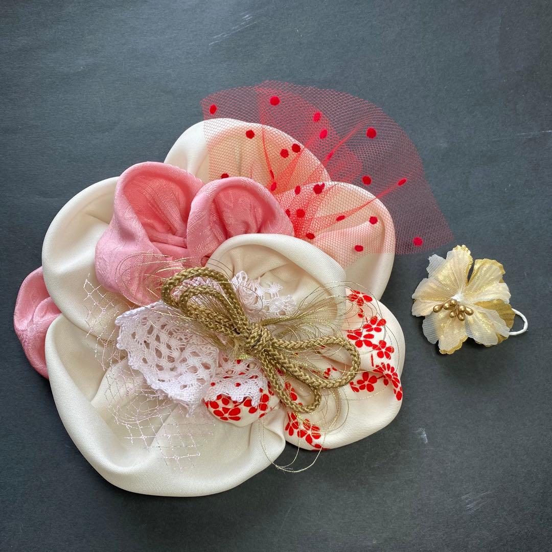 m.y 大きな赤いリボンのヘアアクセサリー とピンクの髪飾り