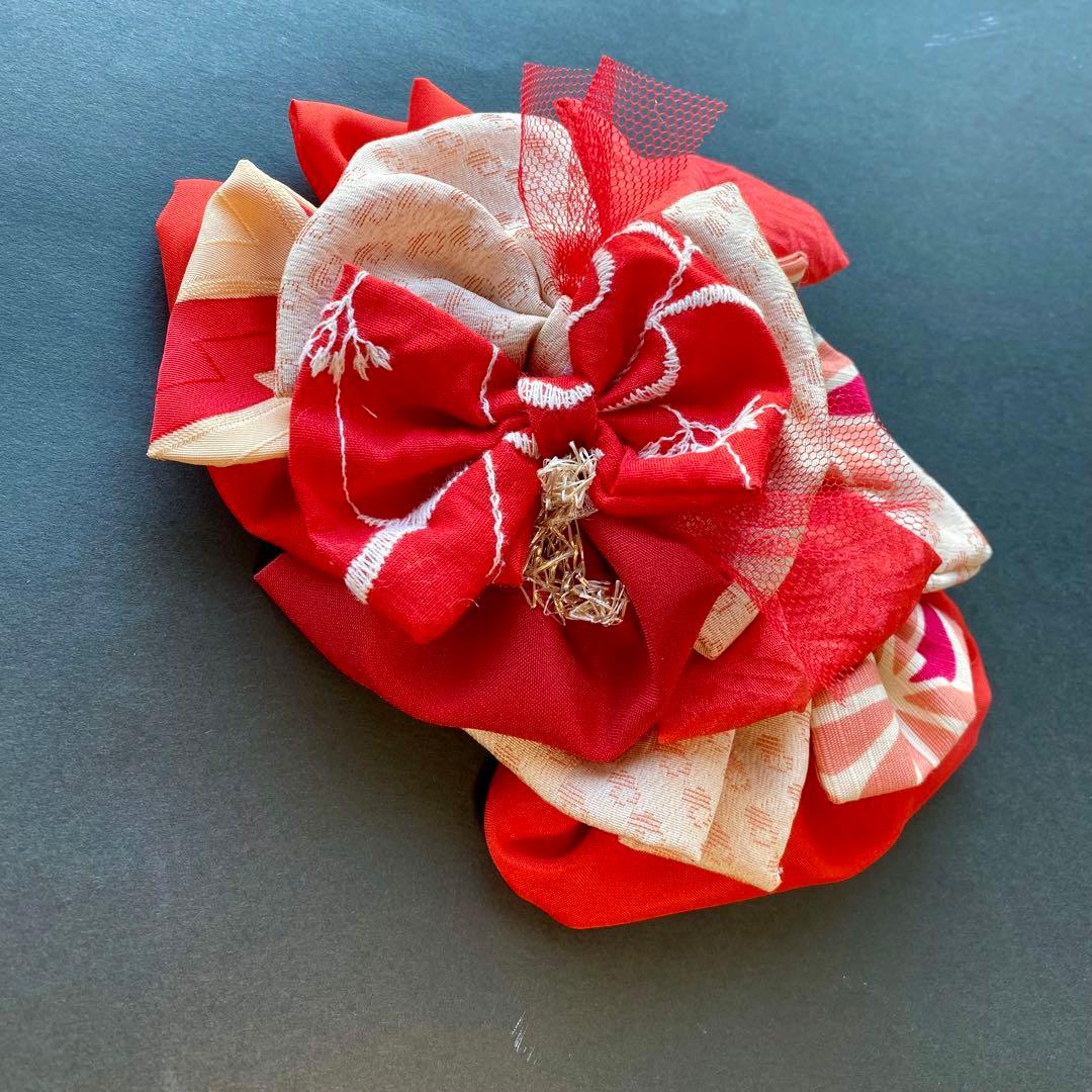 m.y 大きな赤いリボンのヘアアクセサリー とピンクの髪飾り