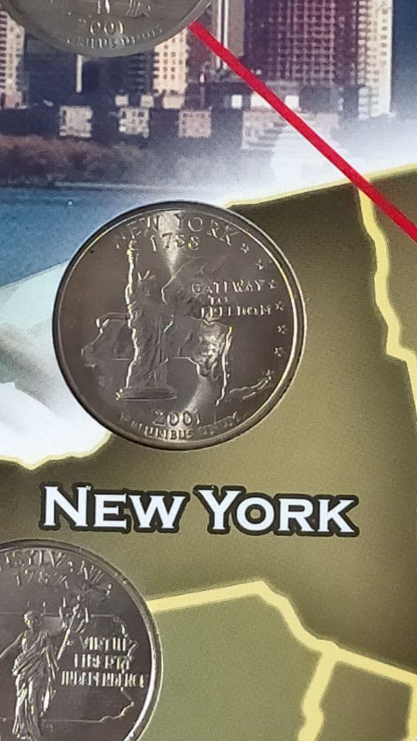 ♥♥。アメリカ25セントクォーター50州記念アルバム(56枚在中)。