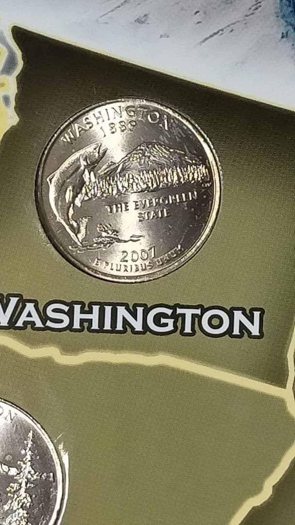 ♥♥。アメリカ25セントクォーター50州記念アルバム(56枚在中)。