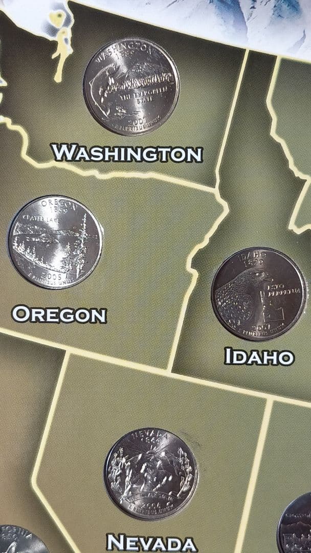 ♥♥。アメリカ25セントクォーター50州記念アルバム(56枚在中)。