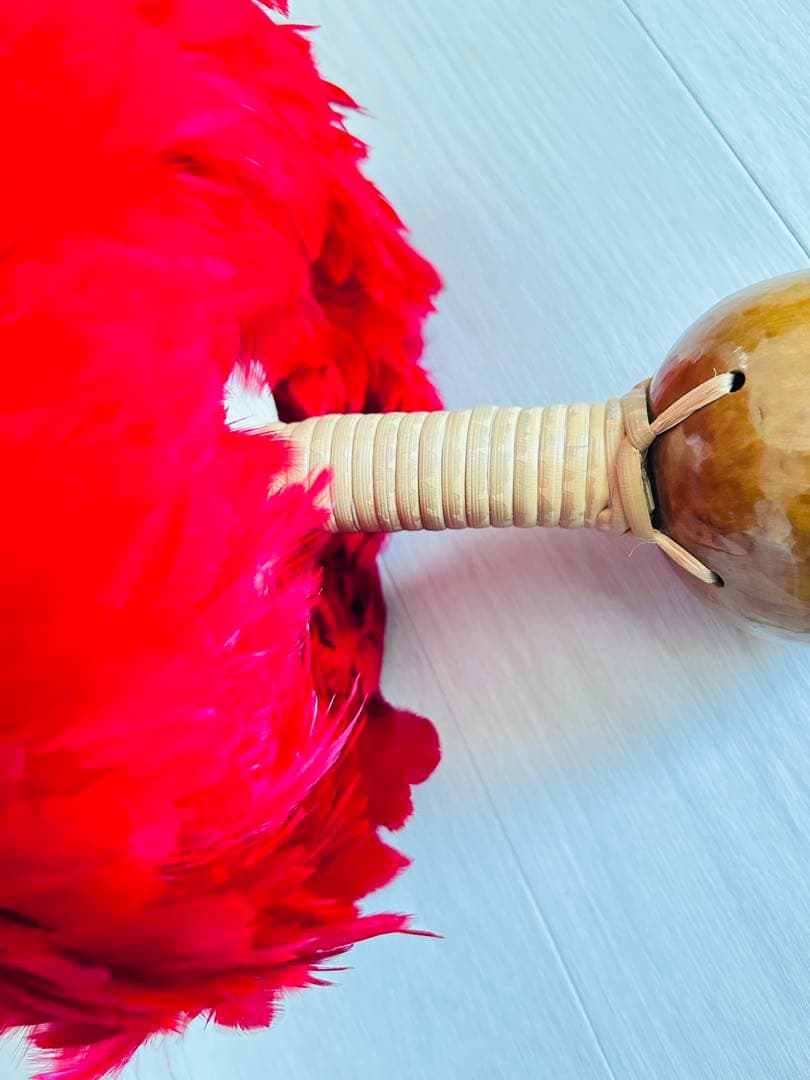 ウリウリ　フラダンス　タヒチアン　赤　羽　黄色　楽器　ハワイ　一体型　２個セット