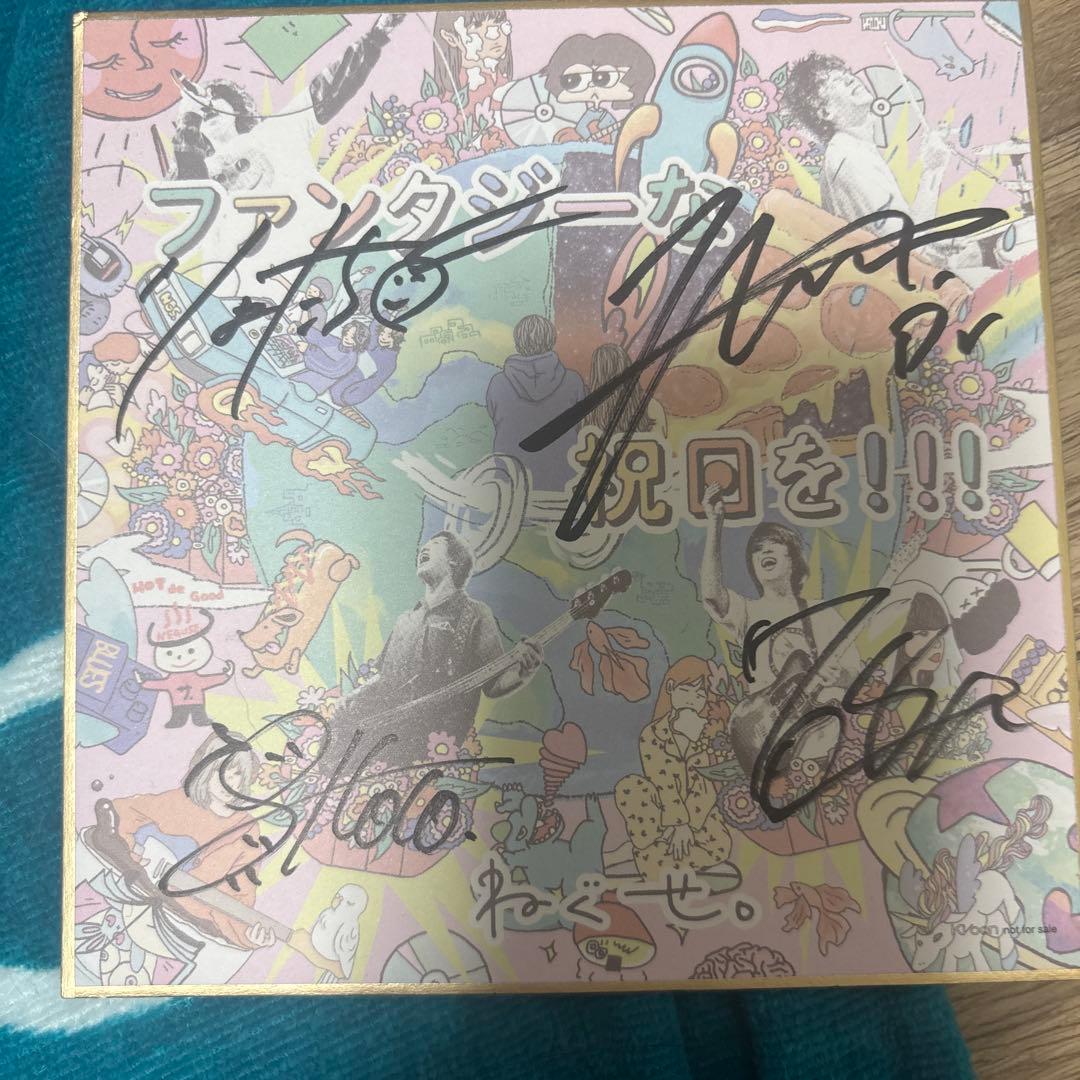 サイン入りCDとバンド付きタオルセット