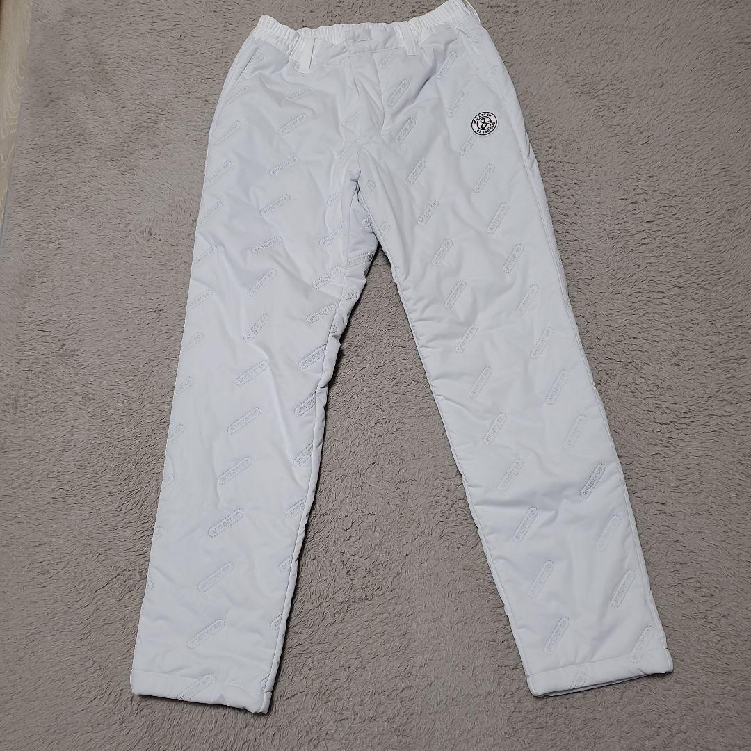 and per se ホワイトパンツ ロゴ刺繍入り