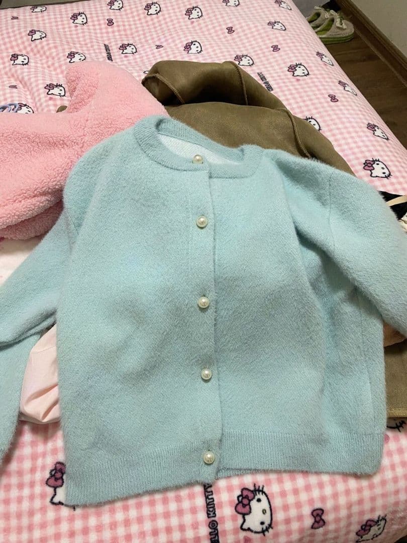 水色ニットカーディガン パールボタン付き