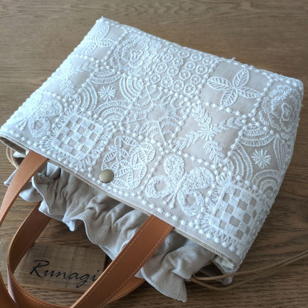 【1560】あおりポケットの巾着バッグ＊ミナペルホネン