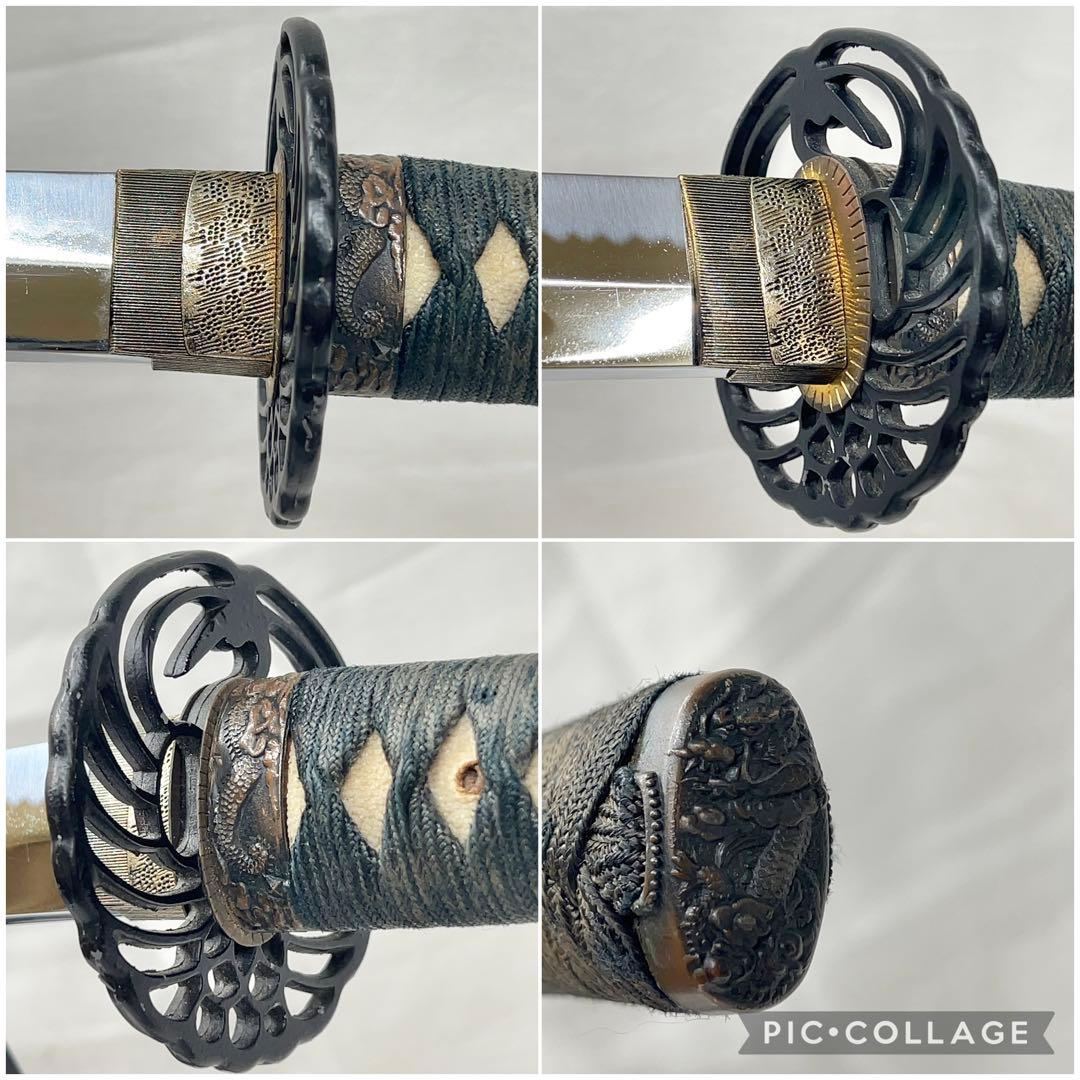 【模造刀】太刀 樋入り 鶴鍔 透かし 全長97.0センチ 黒鞘 互の目 刃紋