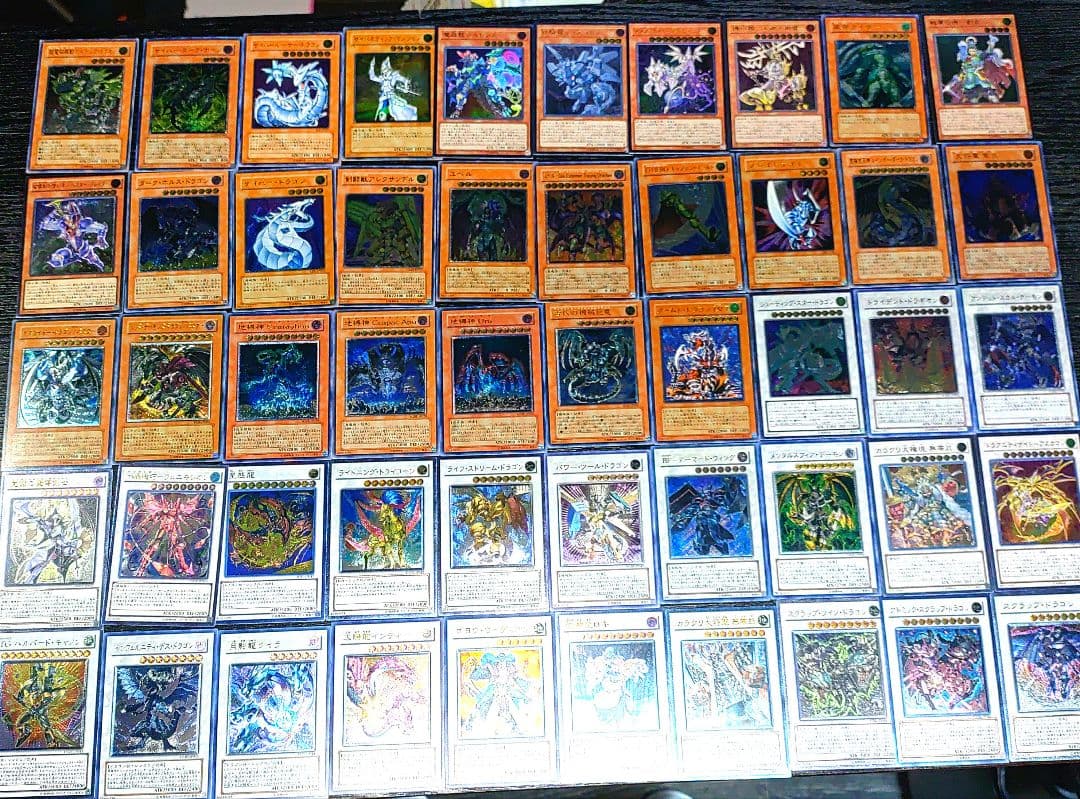 遊戯王 旧レリーフ　100枚 かぶり無し　まとめ売り　比較的綺麗な物多