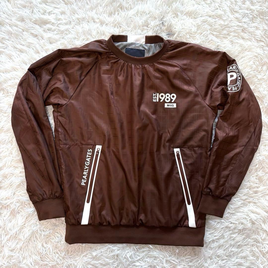 最新作 パーリーゲイツ スニード 蓄熱 総柄 ブラウン 防風 ゴルフウェア