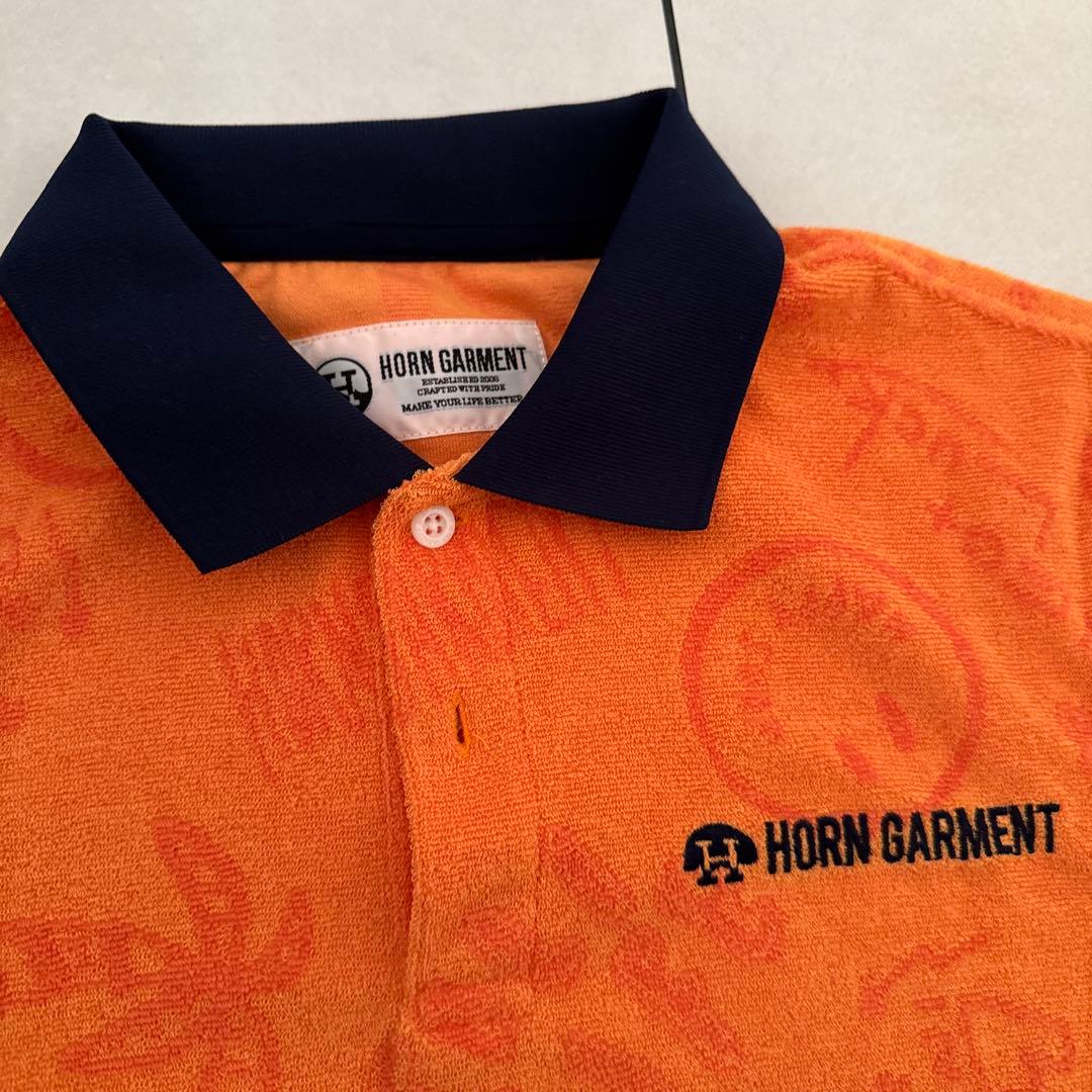 HORN GARMENT ホーンガーメント　ゴルフ　オレンジポロシャツ