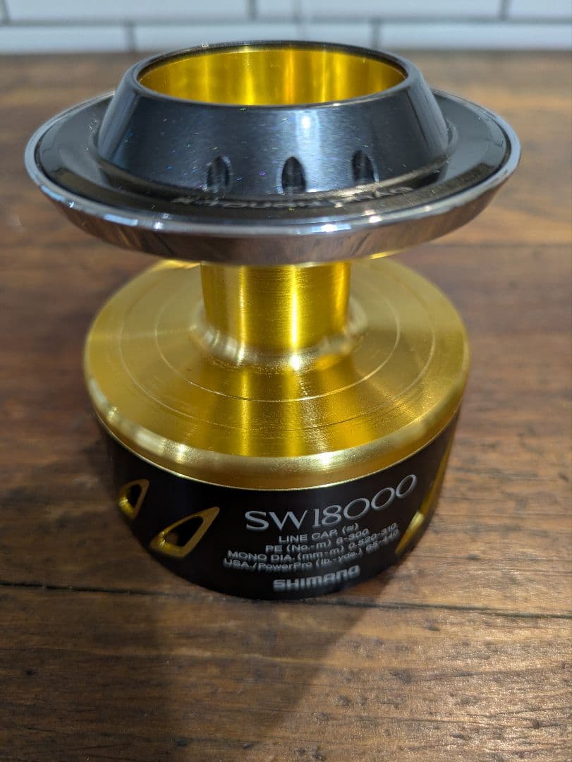 中古シマノ 13ステラ SW18000 純正スプール　 サンライン新品ライン付き