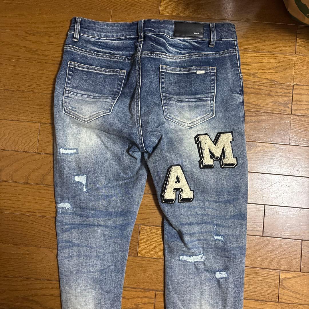 AMIRI ダメージデニムパンツ