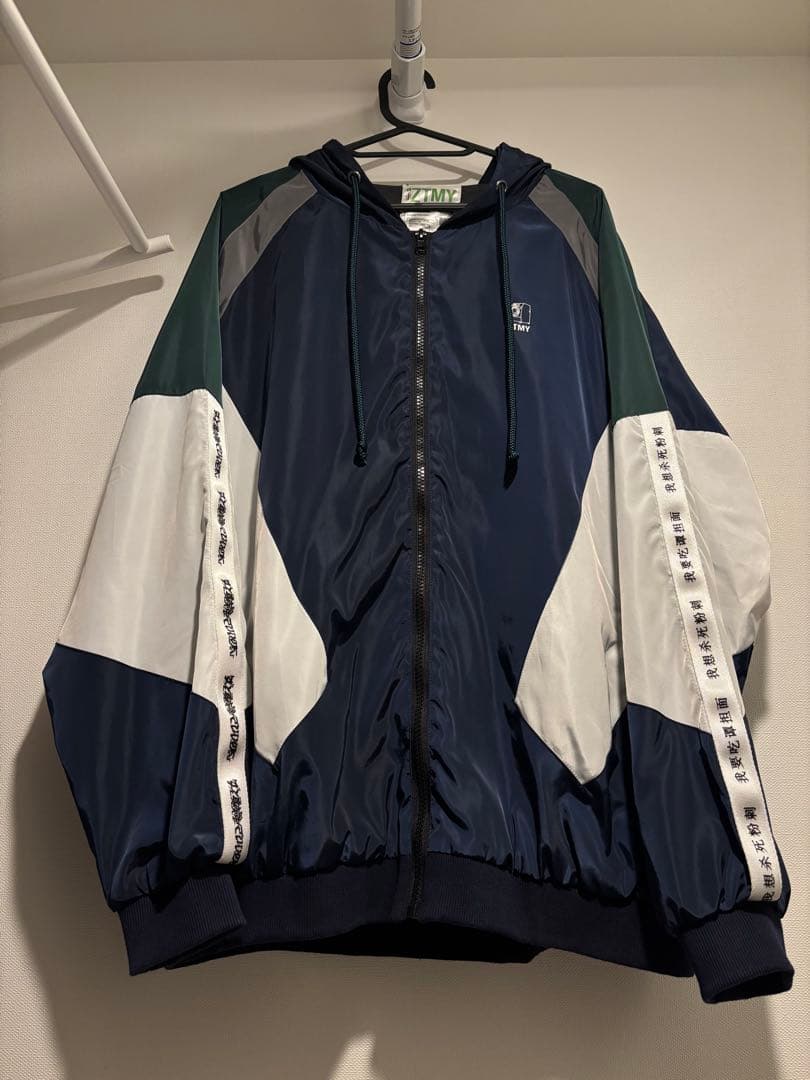 ずっと真夜中でいいのに。温れ落ち度 フード付ナイロンジャケット L