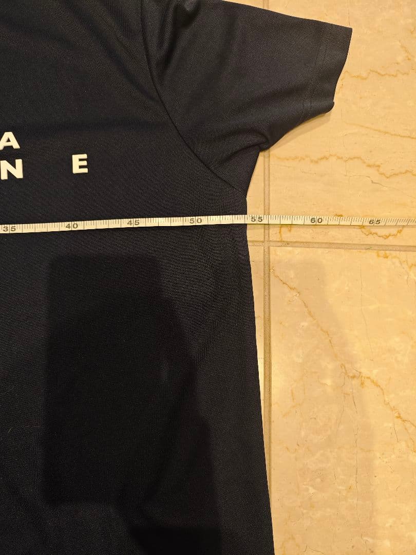 クッキーとなります。muta-mari ムータマリン モックネックシャツ