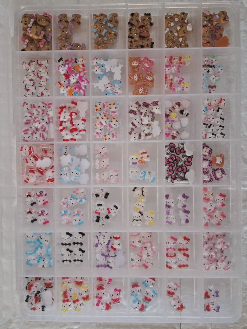 ネイルパーツ大量 ケース入り9箱セット 多様なデザイン