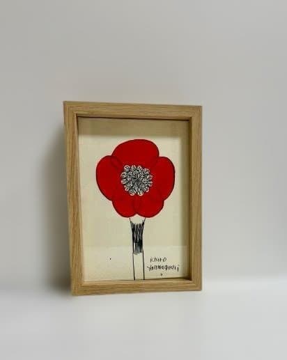 鮮やかな赤いカラーが印象的な原画