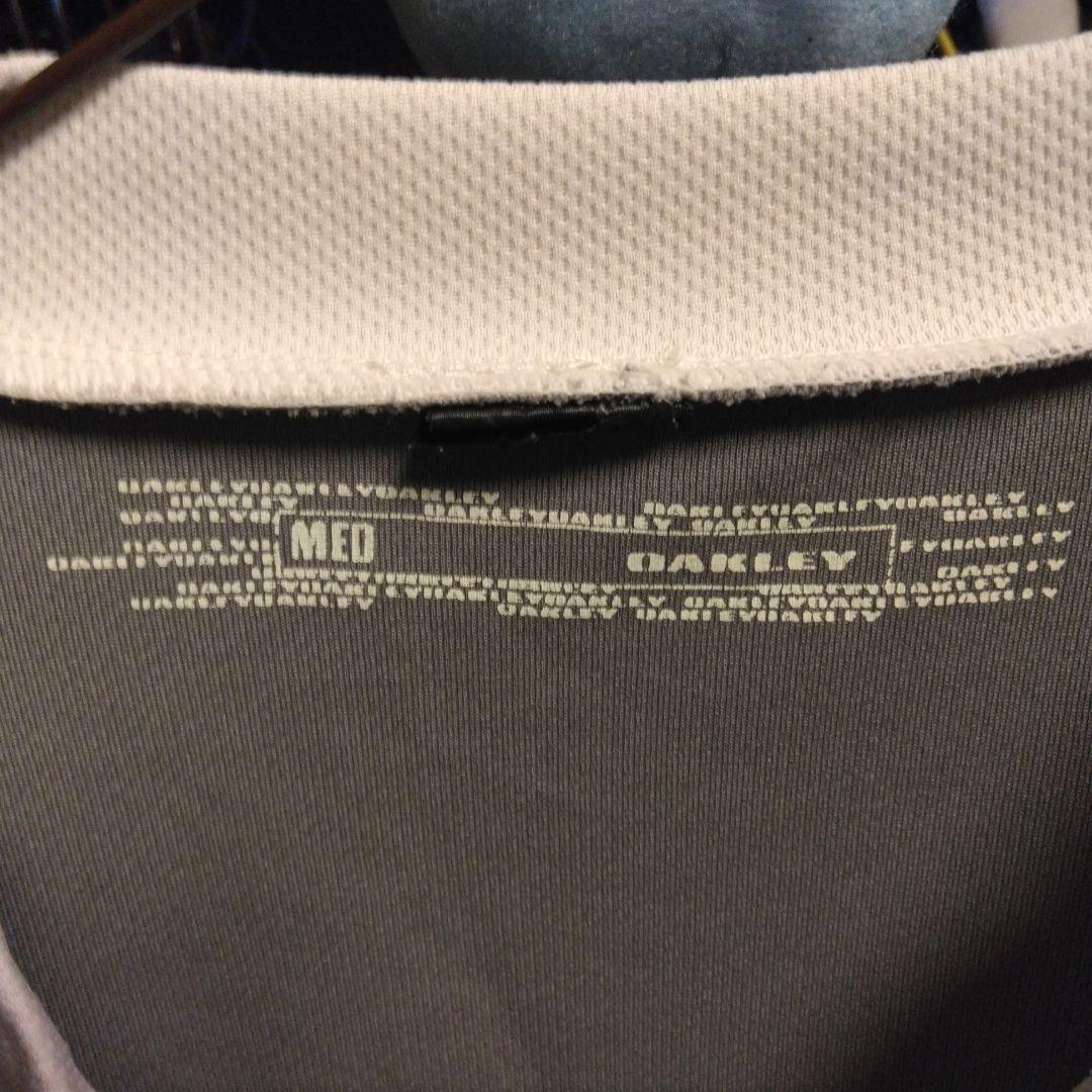 野球ウェア　OAKLEYオークリー　半袖ポロシャツLサイズダークブラックシルバー