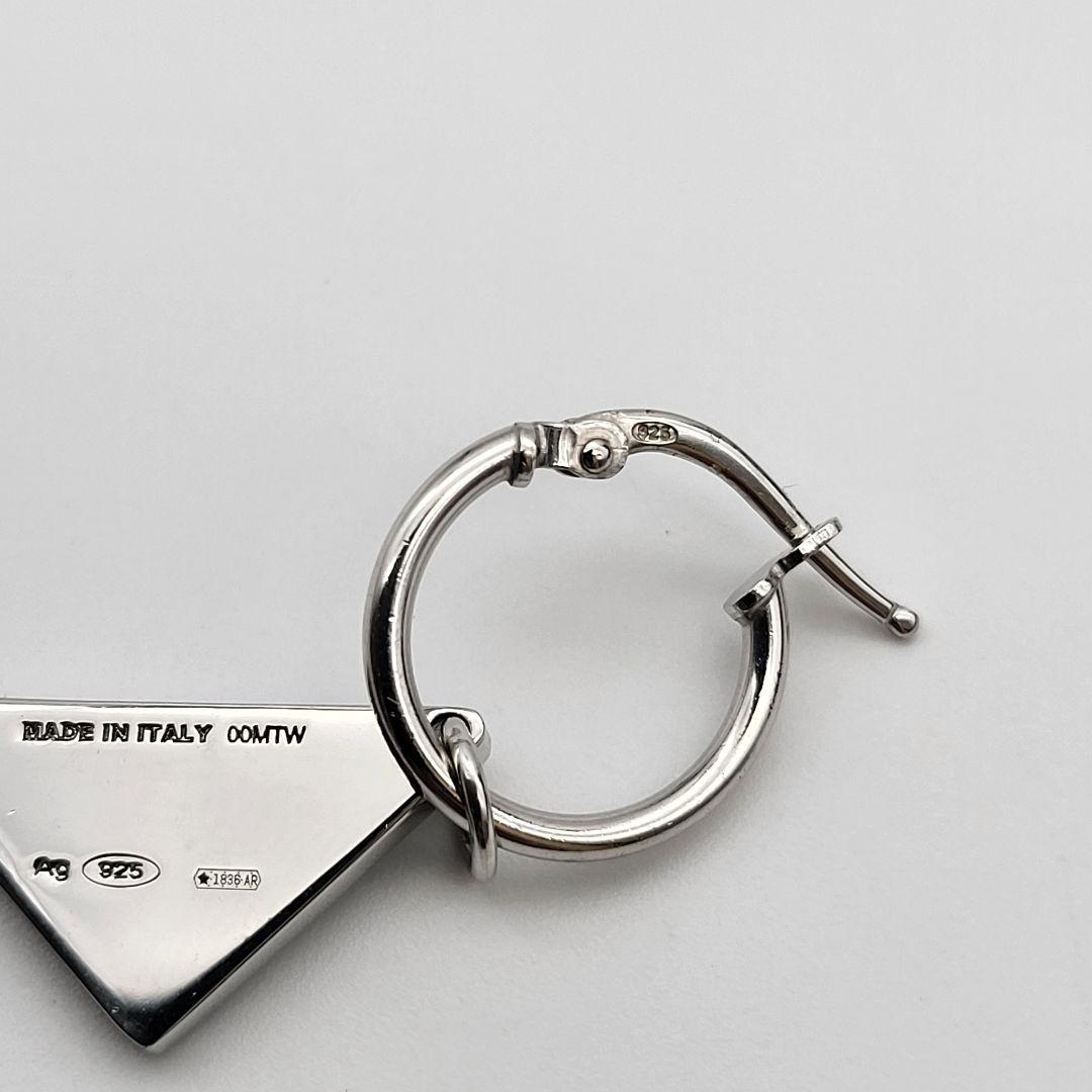 PRADA シルバー 三角形ピアス(片耳用) クリスタルロゴ ジュエル