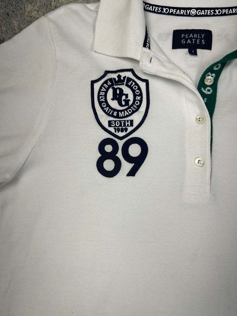 【セットアップ】パーリーゲイツ 鹿の子ポロシャツ & チェック柄ミニスカート 1