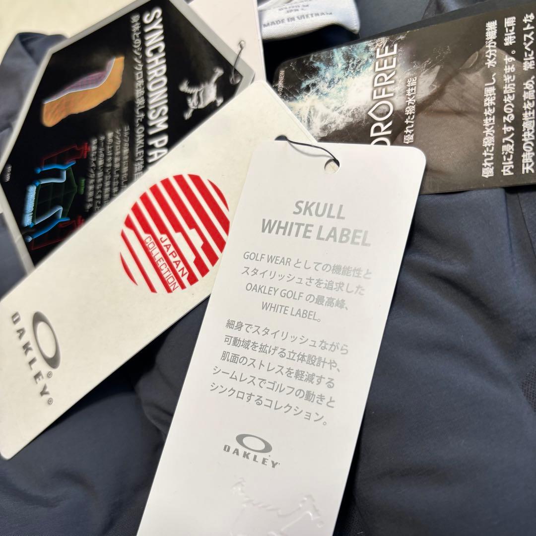 未使用品 オークリー ゴルフ 軽量 ストレッチ ダウンジャケット L