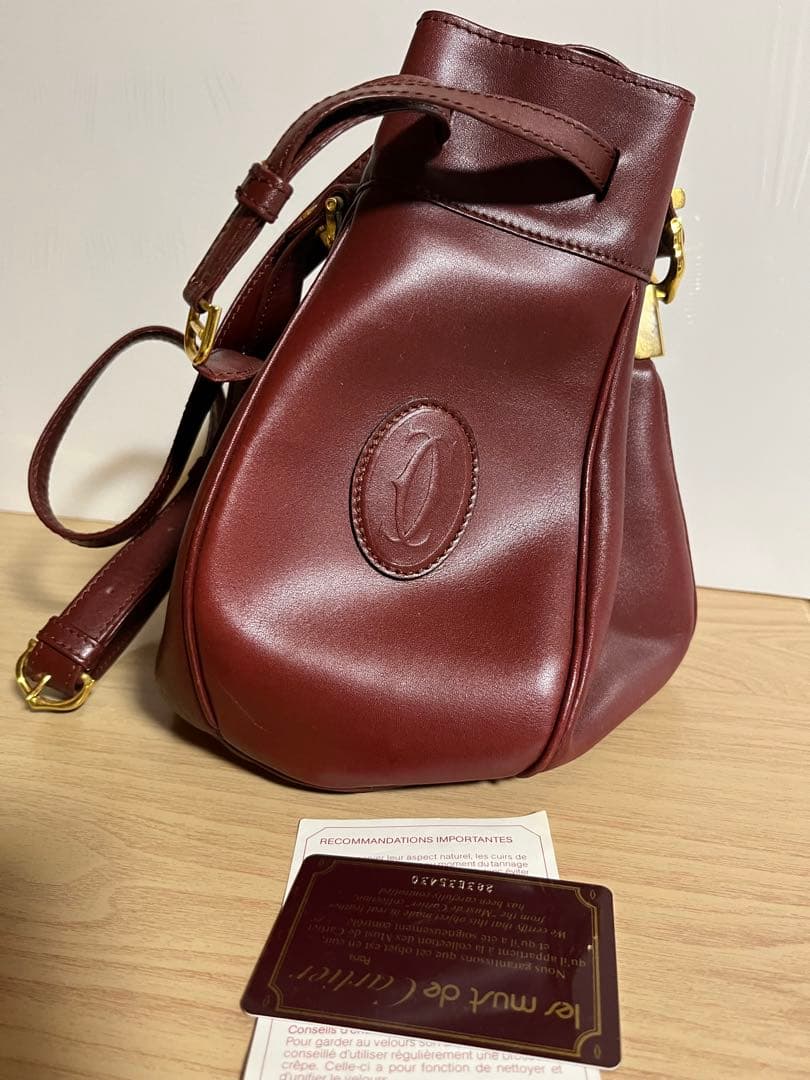 【未使用品 】カルティエ マストライン 巾着ショルダーバッグ レザー ボルドー