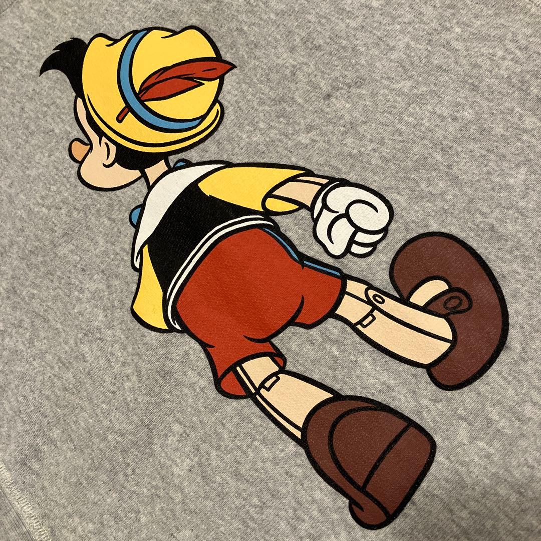 チャンピオン　リバースウィーブ ディズニー　キャラクターピノキオ　スウェット