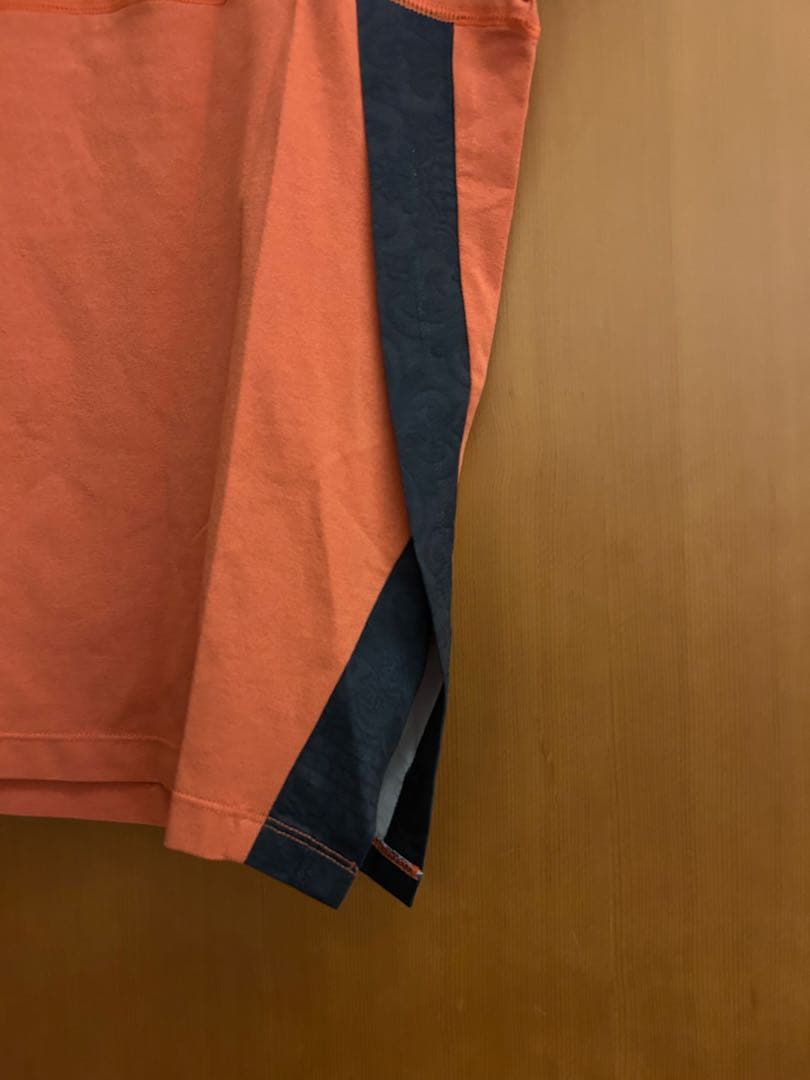 アドミラル　テニスウェア　オレンジ色トップス　Lサイズ