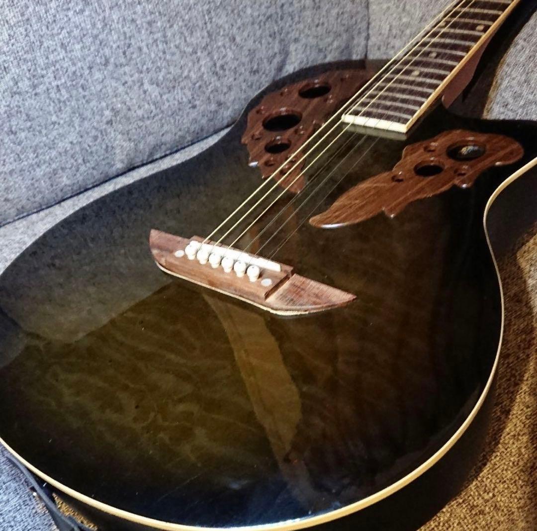 木目の綺麗なオベーションデザインのギター